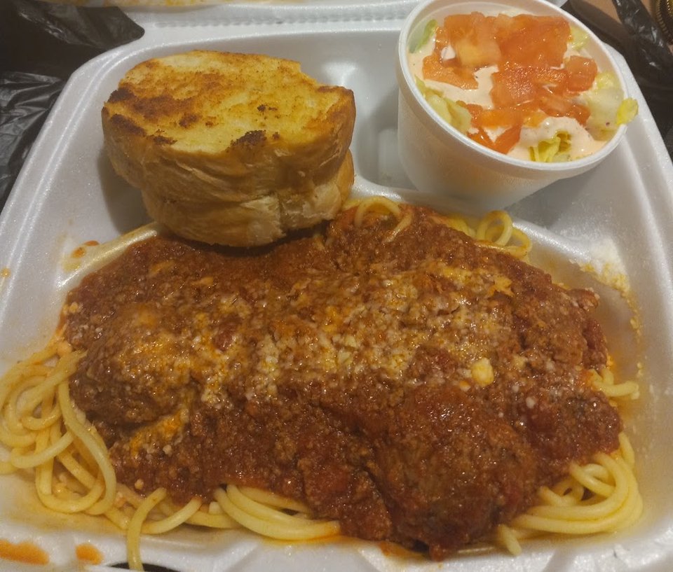 Menu-style food presentation on plates.