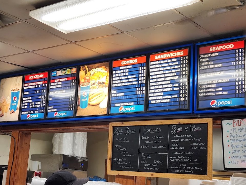 Menu-style food presentation on plates.
